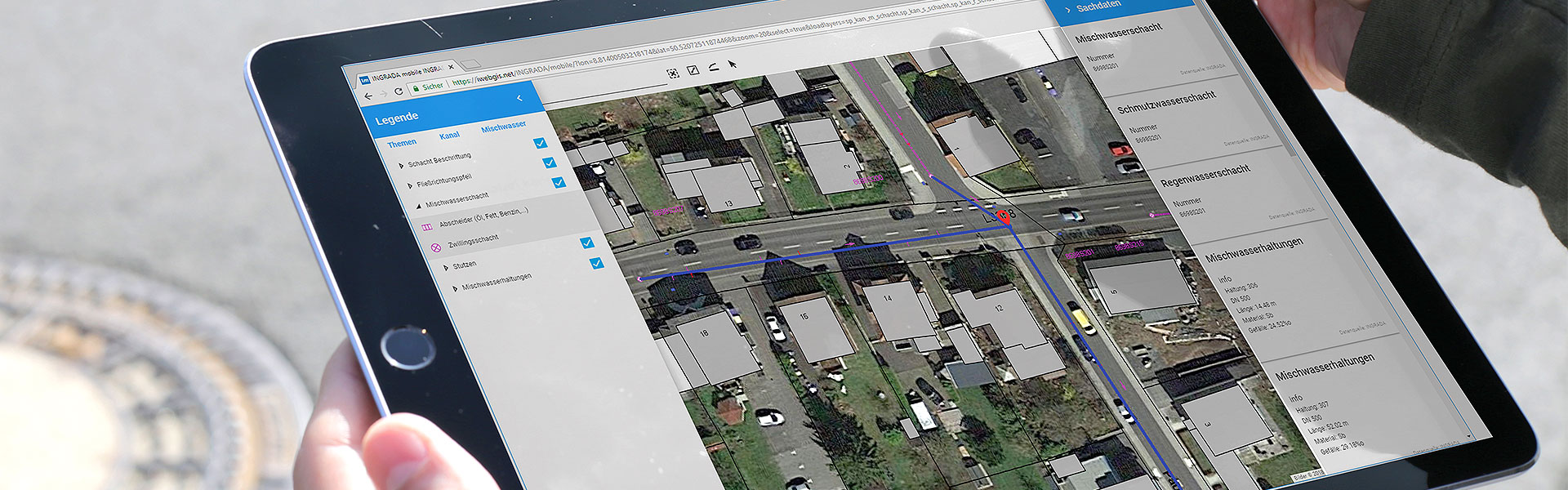 Luftbild eine Häusersiedlung, überlagert mit ALKIS-Daten